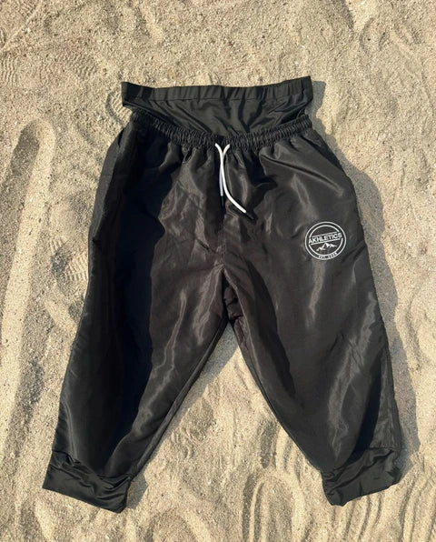 Modest swim shorts in black, front view